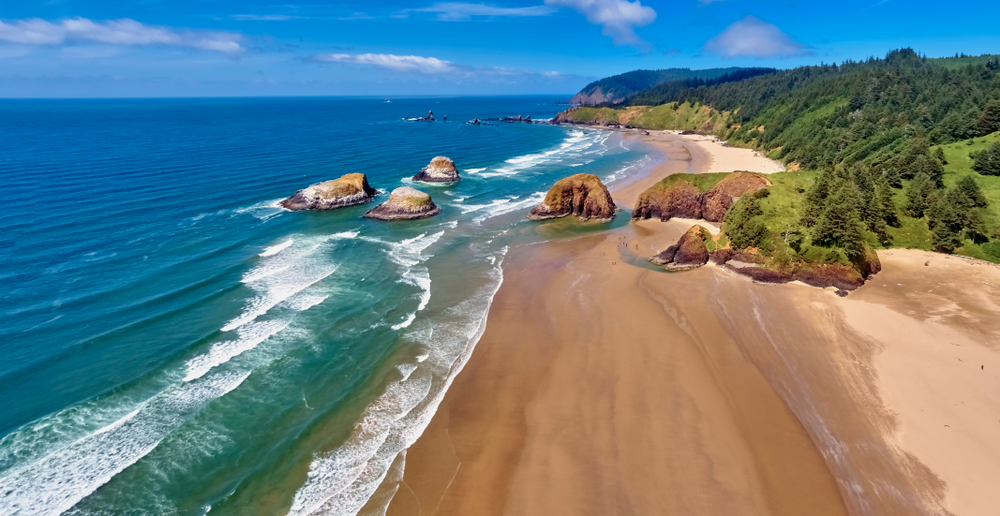 Aerial panoramic view of Cannon Beach Oregon looking toward Ecola State Park